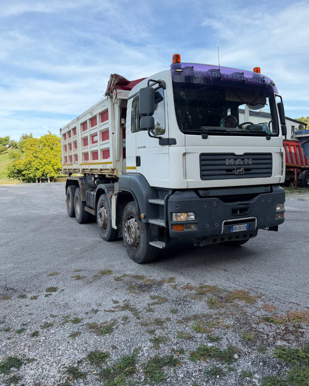 MAN TGA 41.480 + RIBALTABILE OCM AUTOCARRO